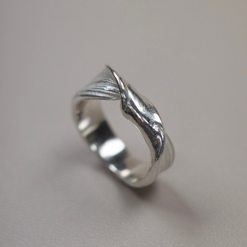Handcrafted Silver ring with a twisted design
