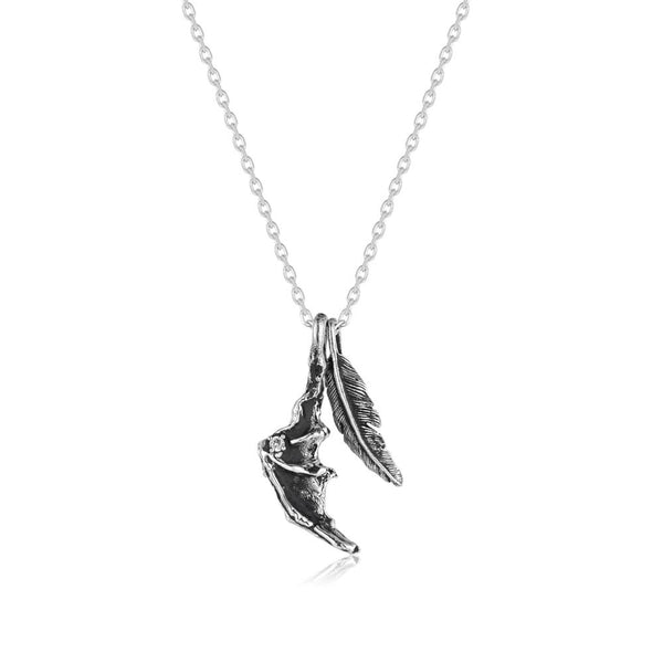 shadow dragon wing pendant necklace on a white background