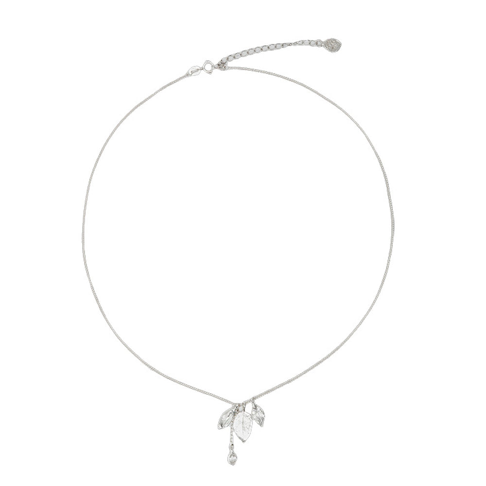 Silver botanical necklace with leaf pendant on a white background