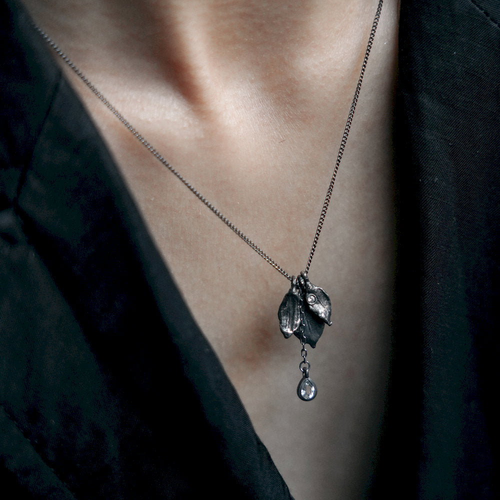 Black handmade dainty Necklace with a leaf pendant